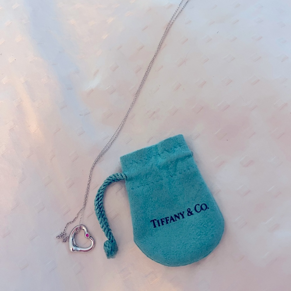 Tiffany Elsa Peretti open heart pendant and necklace.